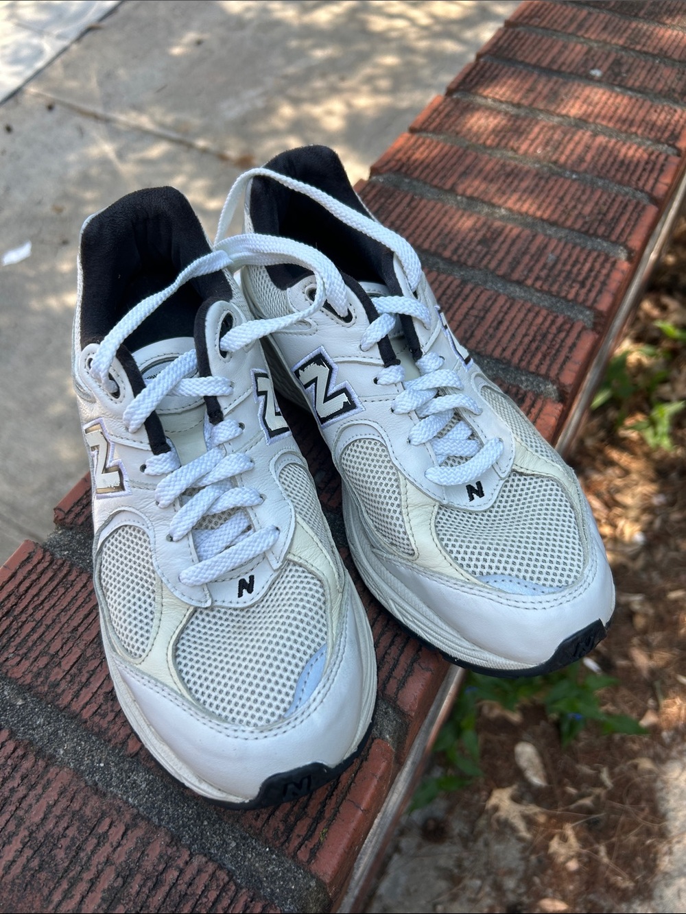New Balance womens White and Black Running Sneakers